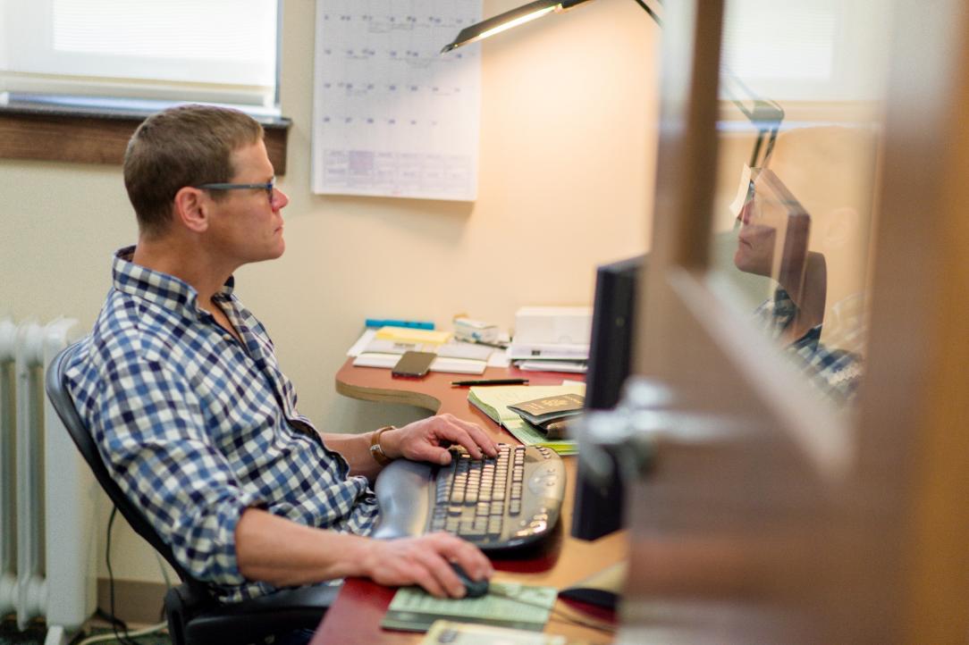 ThermoAnalytics employee working at desk