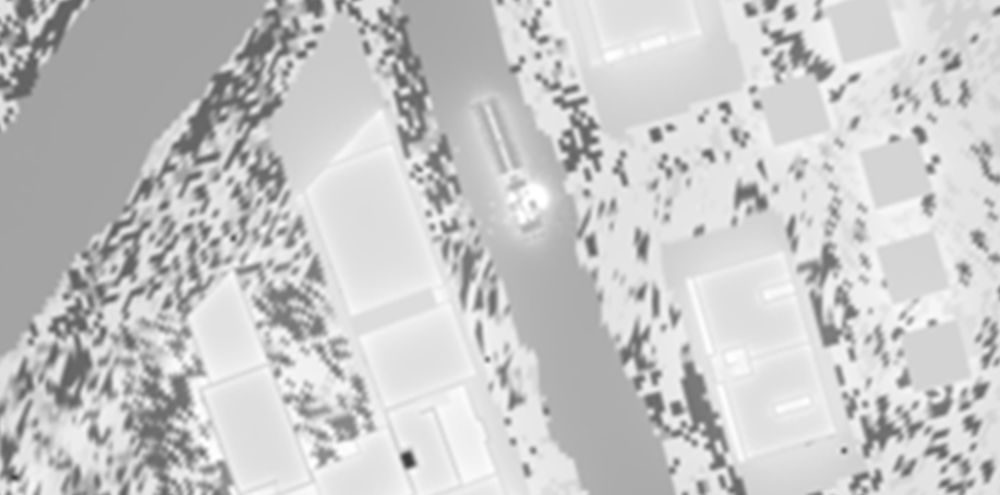 Aerial infrared view of a vehicle traveling along a road through a suburban area.